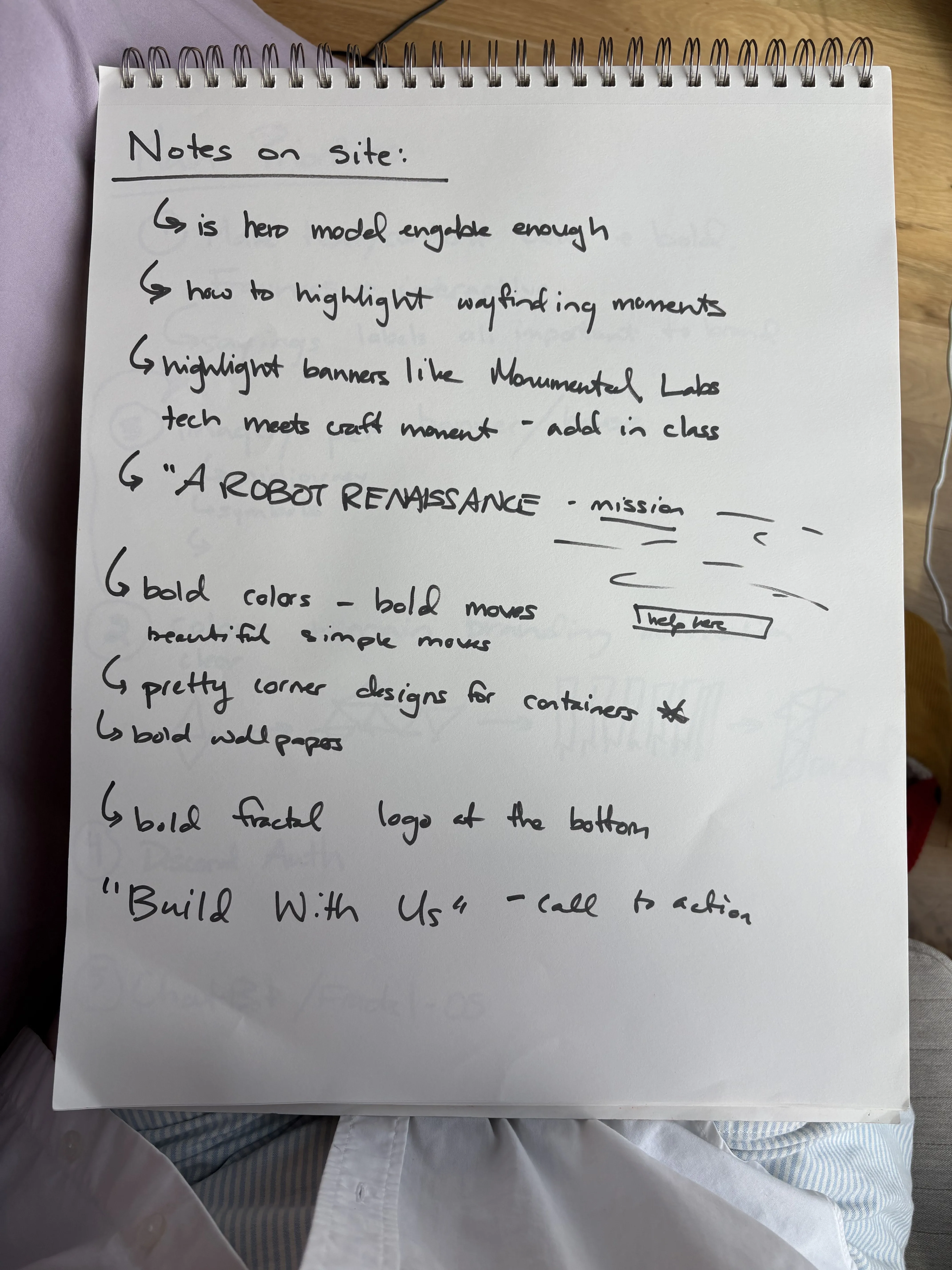 Notebook notes reviewing the site’s wayfinding and visual direction